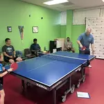 Table-tennis is a sport for all ages. Here's 7-year old Easton Deng playing senior Steve Roberts!