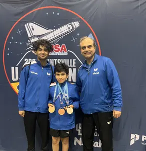Atharva with his happy coaches