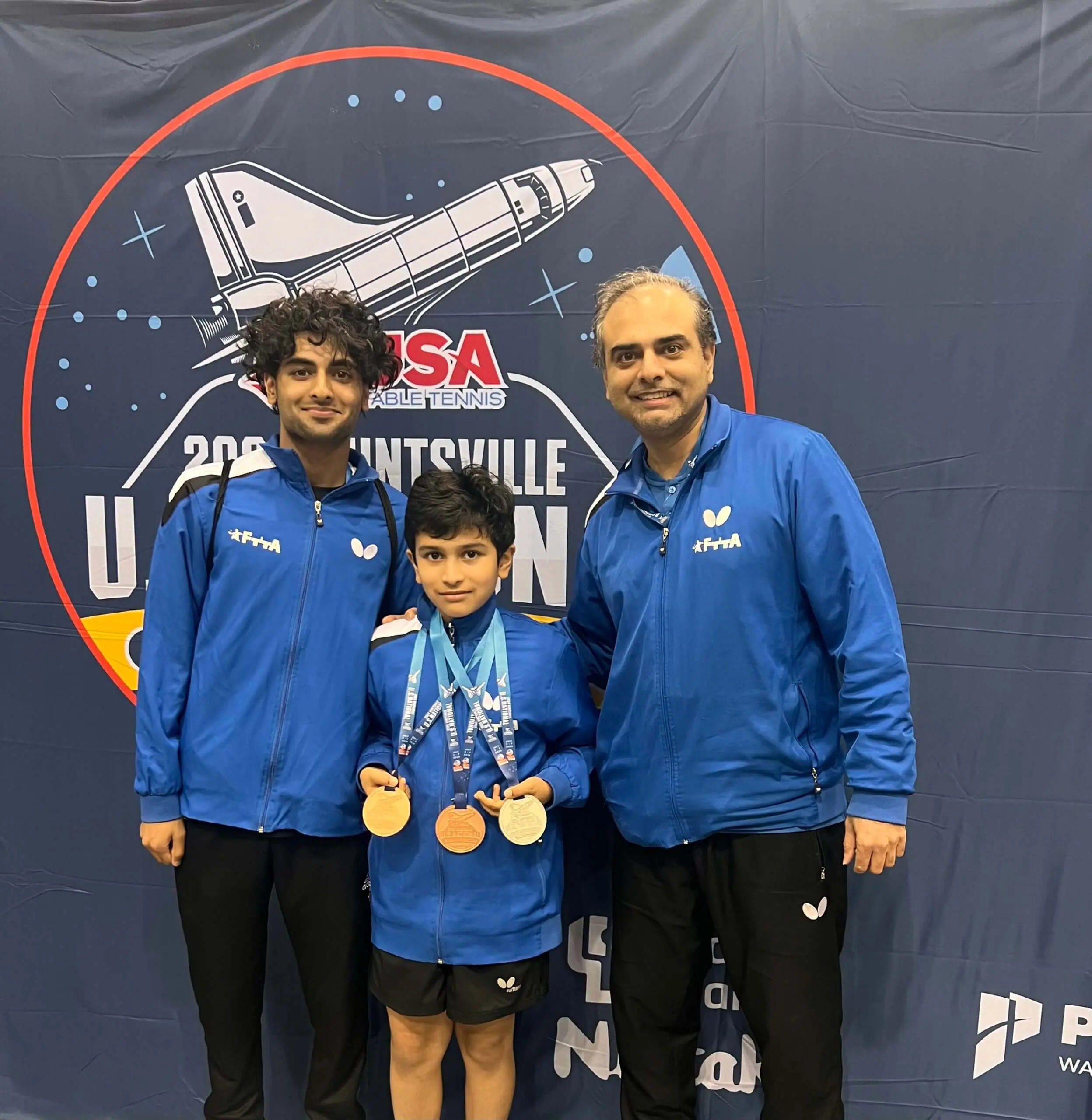 Atharva with his happy coaches