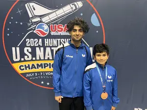 Atharva with happy coach Umar