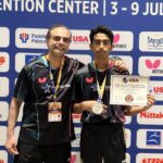 Anchit Nayak with his silver medal and coach
